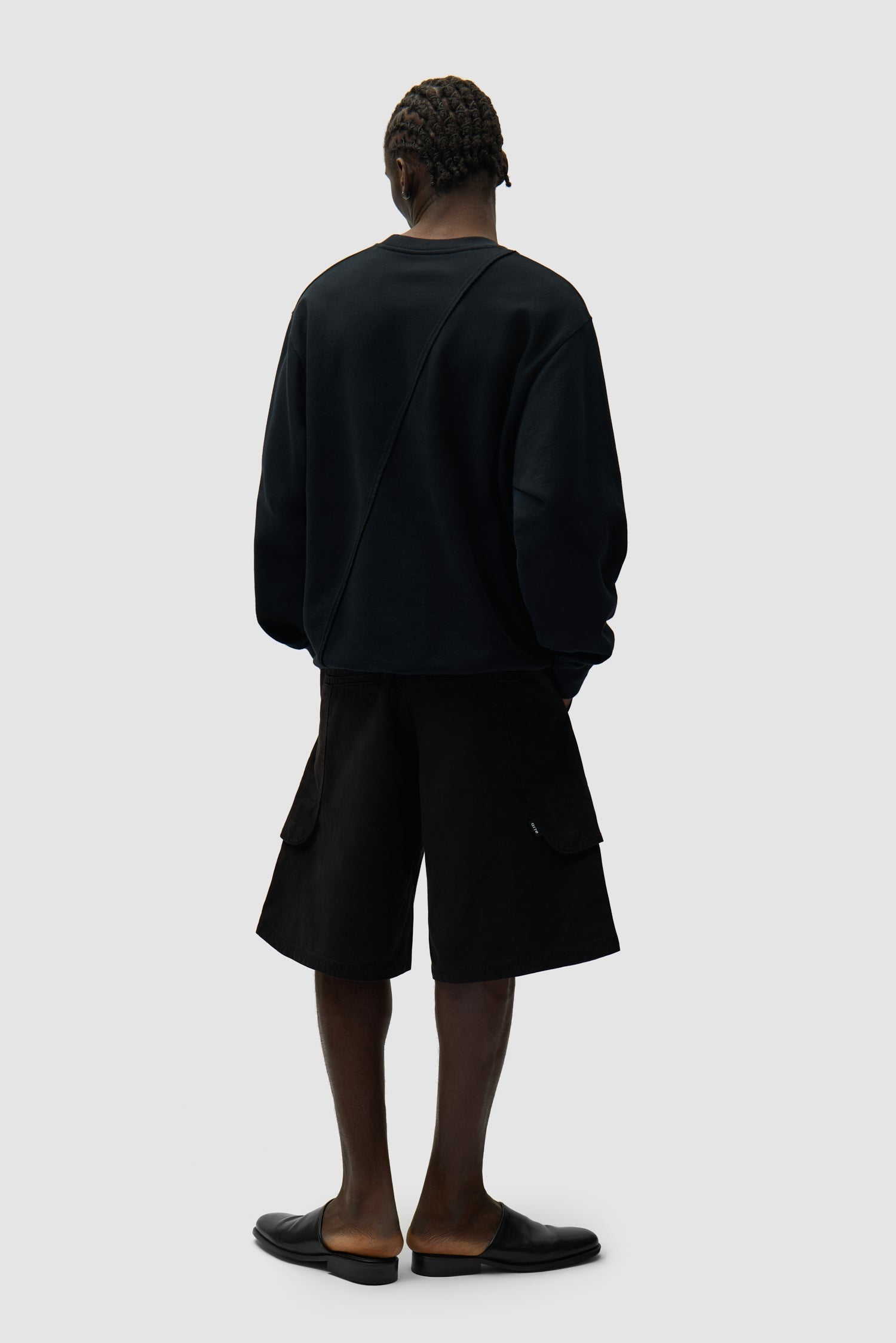 Pull brodé avec logo circulaire - Noir