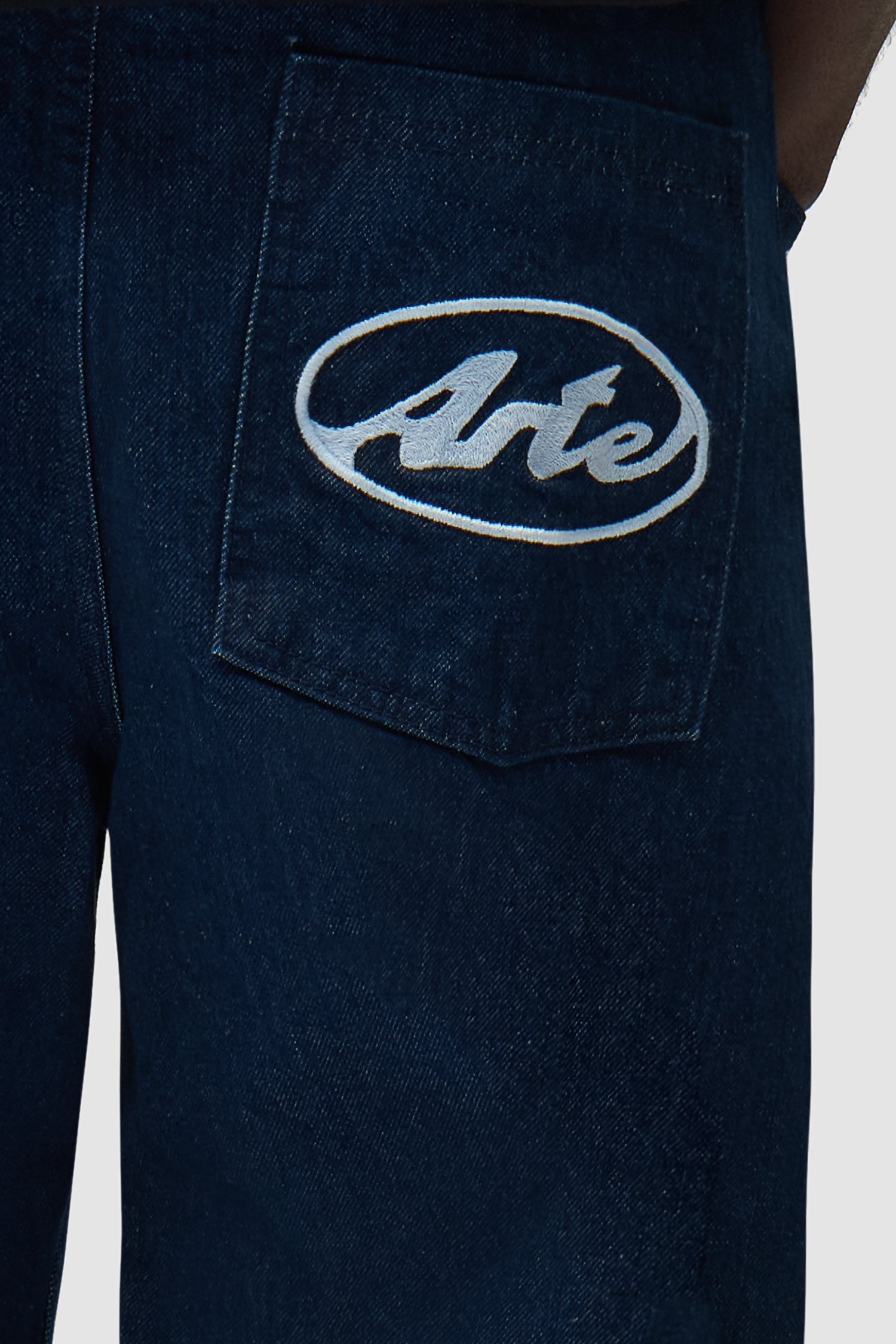 Pantalon à poche avec logo circulaire - Denim brut