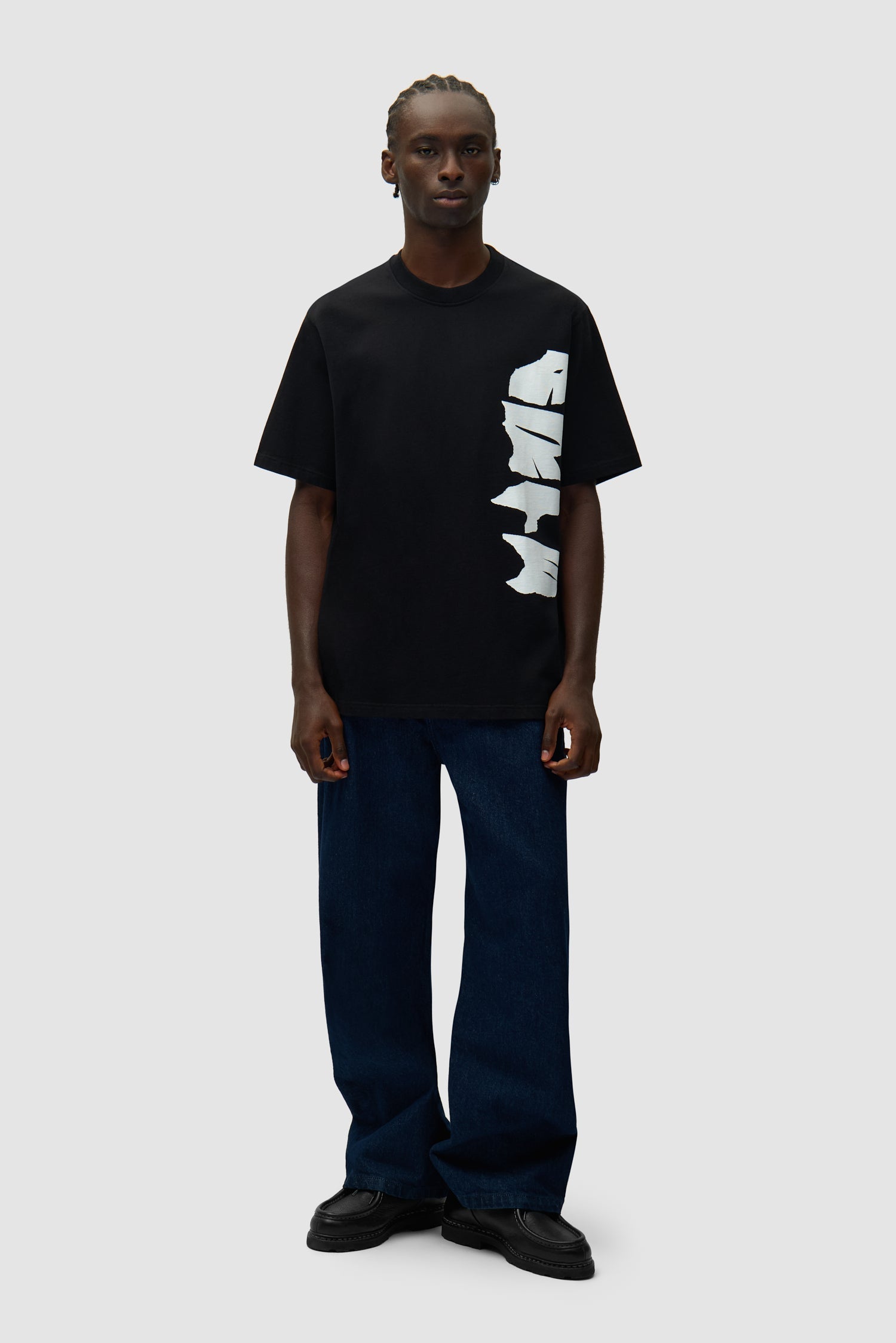 Pantalon à poche avec logo circulaire - Denim brut