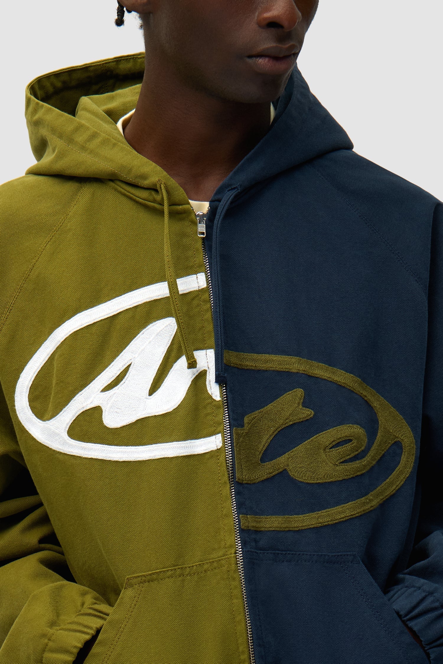 Veste à capuche en toile avec logo divisé - Bleu marine/Vert