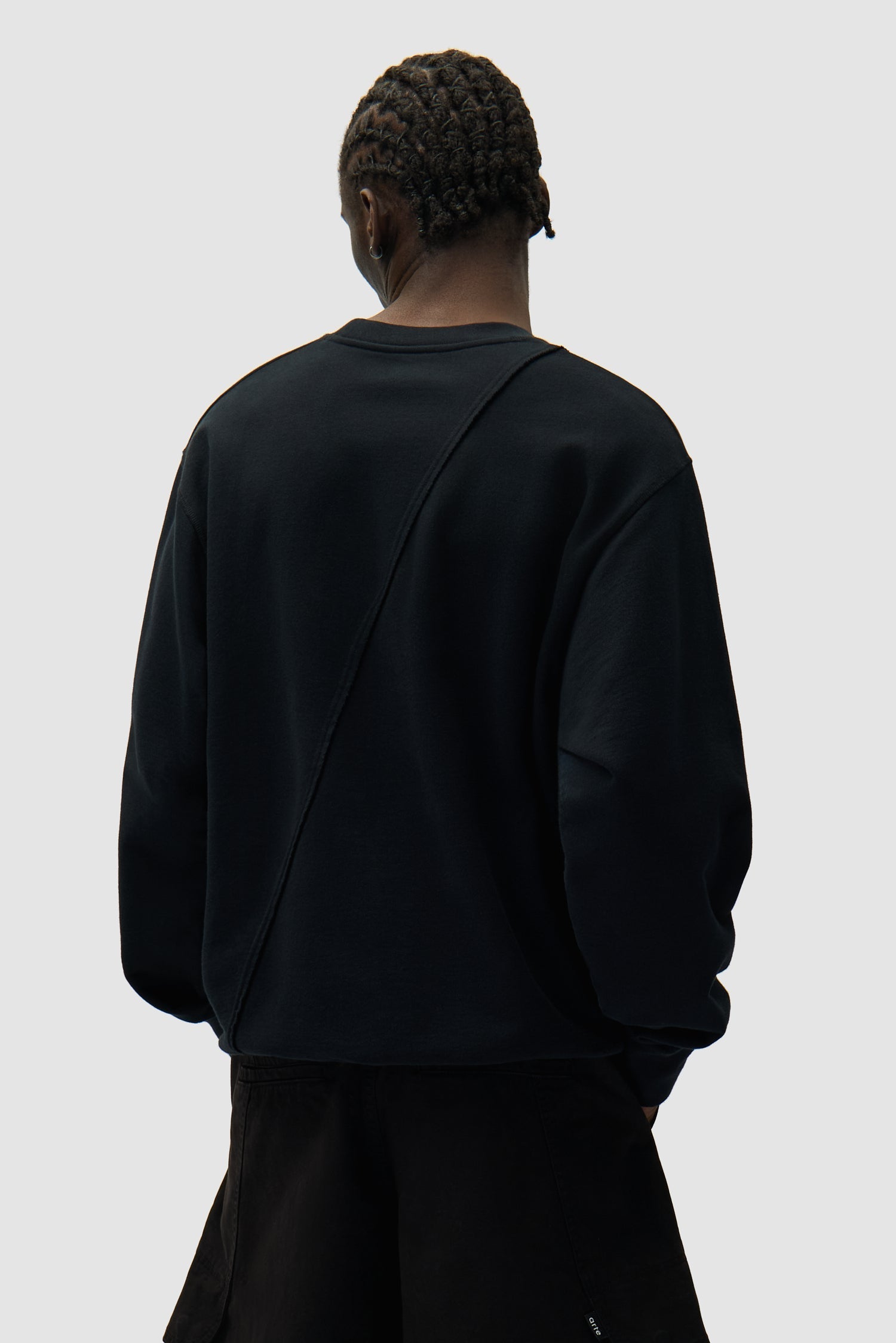 Pull brodé avec logo circulaire - Noir